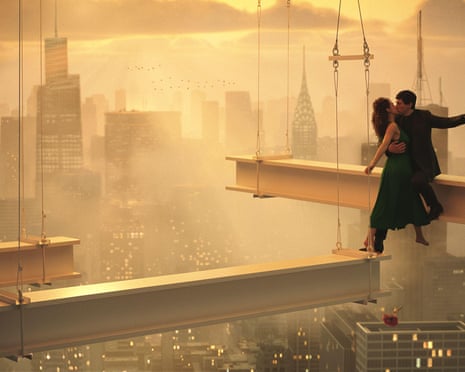 Nathalie Emmanuel and Adam Driver kiss balanced on girders high above the city in Megalopolis