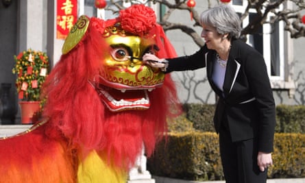 Theresa May at a cultural reception held at the British ambassador’s residence in Beijing.