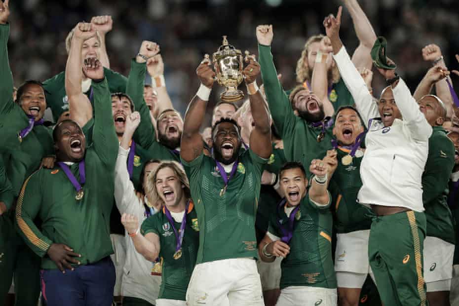 Kolisi lifts the Webb Ellis Cup after the Springboks defeated England in the 2019 final in Yokohama.