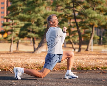 A man lunging in a park