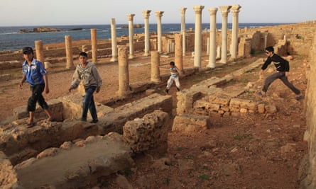 Children walk at Apollonia near the ancient Greek and Roman city of Cyrene, in Libya. Apollonia served as a port for the export of silphium.