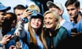 Marine Le Pen posing in a selfie with a female supporter.