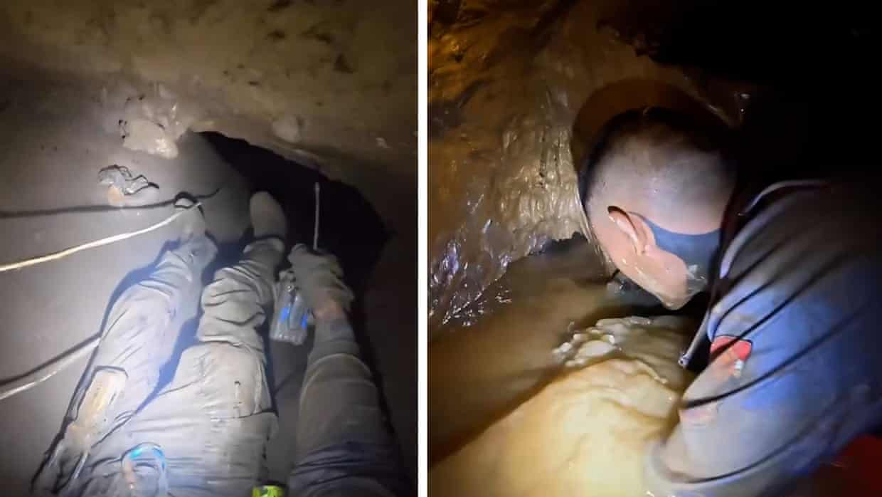 Rescue team enters flooded cave in Laos in effort to free seven people – video