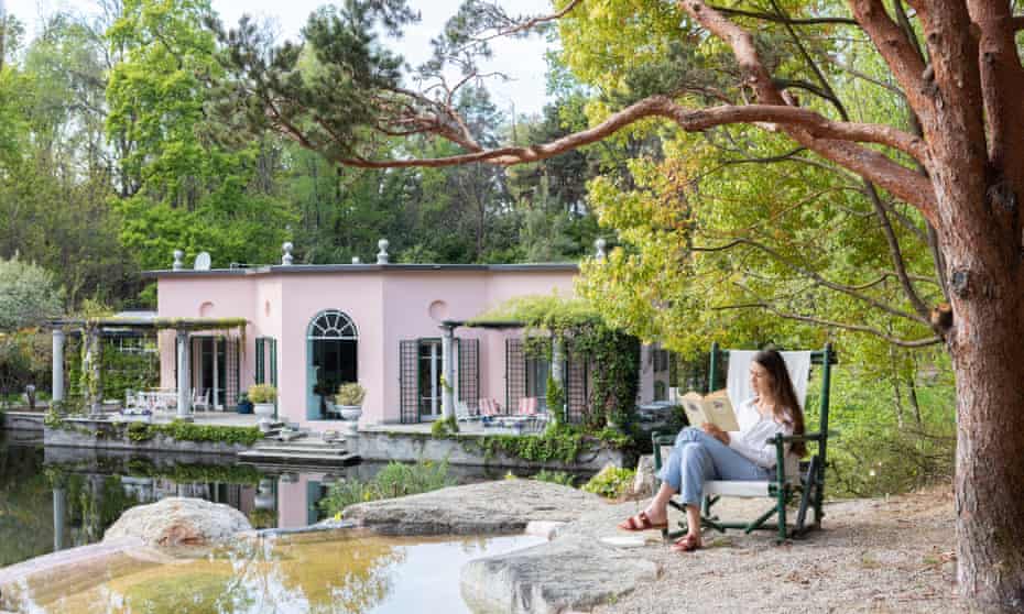 Gemma Richards reading outside the Villa Ottagonale, in a garden filled with rare botanical specimens.
