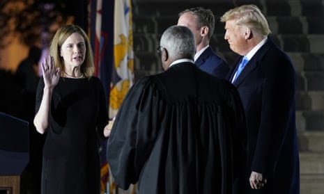 Donald Trump<br>President Donald Trump watches as Supreme Court Justice Clarence Thomas administers the Constitutional Oath to Amy Coney Barrett on the South Lawn of the White House in Washington, Monday, Oct. 26, 2020, after Barrett was confirmed by the Senate earlier in the evening. (AP Photo/Patrick Semansky)