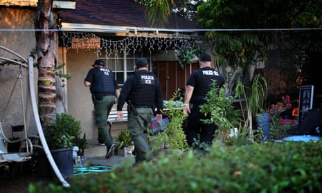 Immigration and Customs Enforcement agents conduct a raid in Riverside, California.