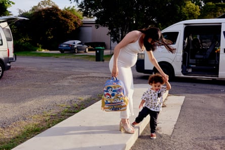 Deslie with her son outside her school formal