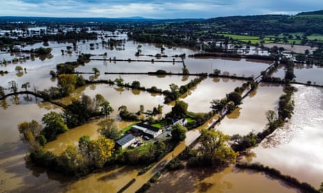 Flooded fields in Powys in Wales, after Storm Babet battered the UK, causing widespread flooding and high winds in October 2023