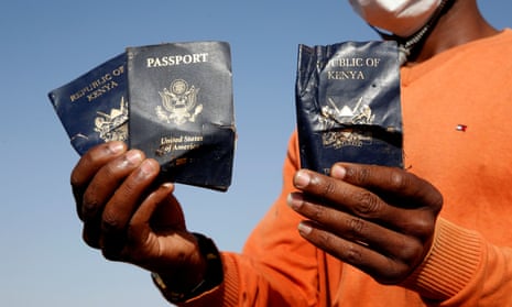 Man holds passengers' passports found at the scene of the Ethiopian Airlines Flight ET 302 plane crash, near the town of Bishoftu, near Addis Ababa<br>A man holds passengers' passports found at the scene of the Ethiopian Airlines Flight ET 302 plane crash, near the town of Bishoftu, near Addis Ababa, Ethiopia March 12, 2019. REUTERS/Baz Ratner