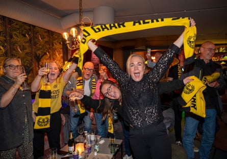 Mjällby fans start the party after their team’s 2-0 win secured the league title.