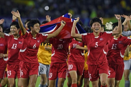 Kim Kang-mi, Oh Sol-song, Choe Il-Son and the North Korea players celebrate their U20 title in 2024