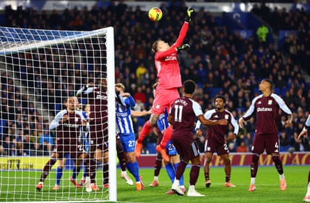 Marco Bizot flaps at a corner ineffectively with the ball sailing over him