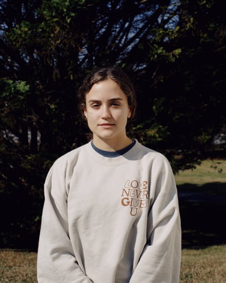 young woman in beige sweater