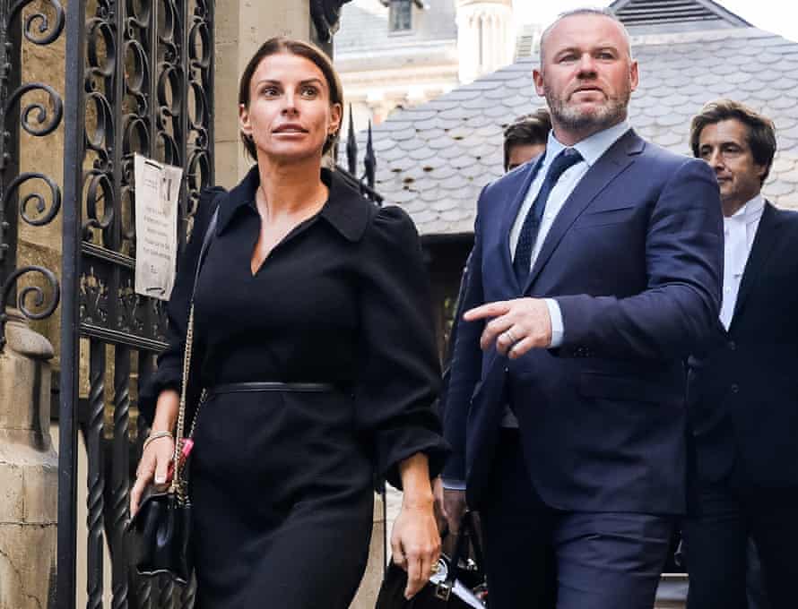 Coleen Rooney and Wayne Rooney leave the Royal Courts of Justice, Strand on May 17, 2022 in London, England.