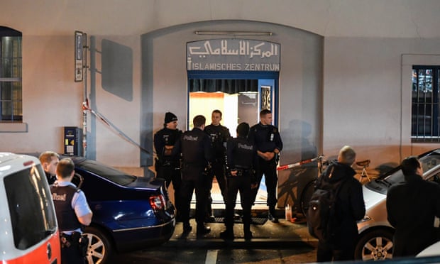 Policemen secure the area in front of the Islamic centre after a shooting in Zurich. 