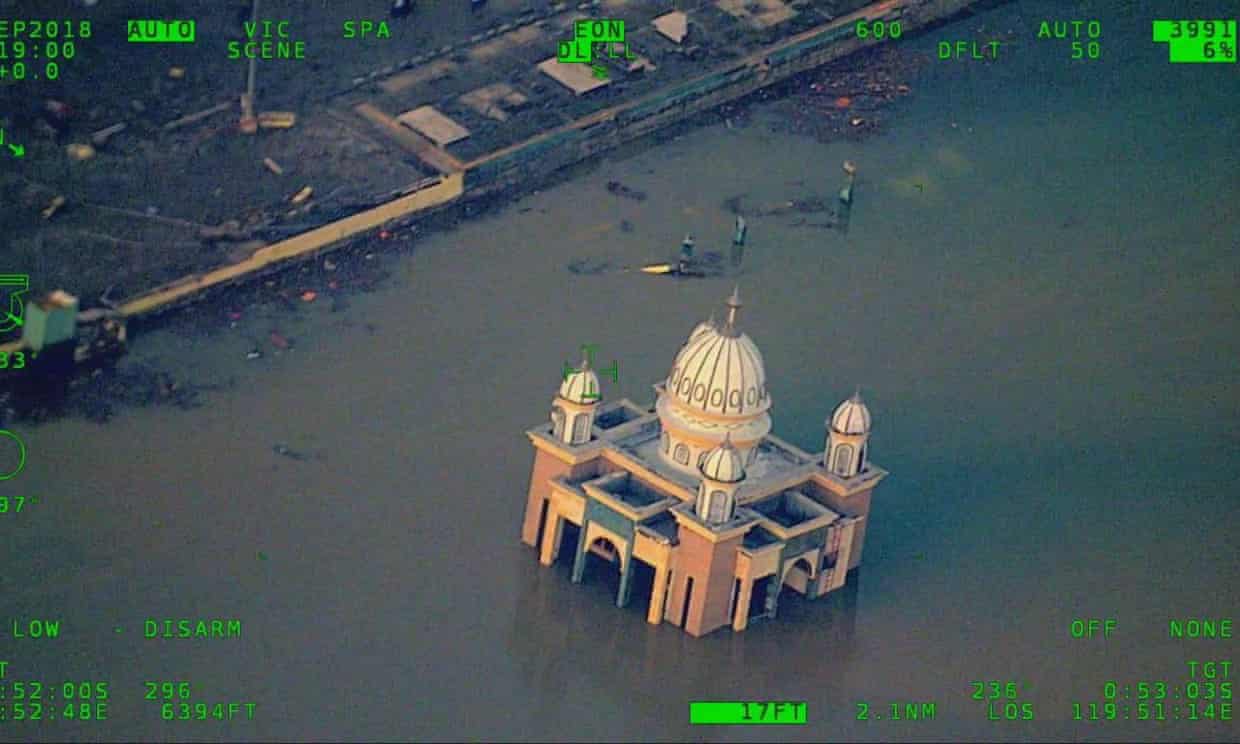 Buildings remain submerged in Palu, Indonesia, following a quake-induced tsunami.
