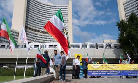 Iranian opposition members protest outside the IAEA headquarters in Vienna on Monday