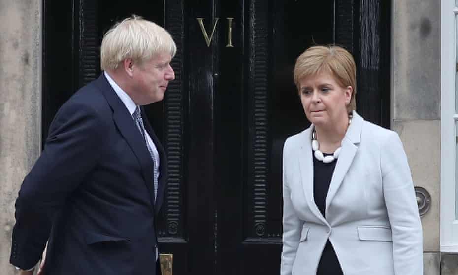 Boris Johnson pictured with Nicola Sturgeon in July last year outside Bute House in Edinburgh.