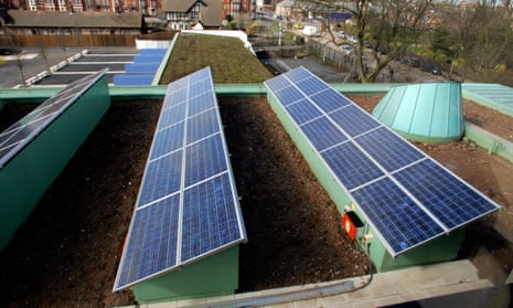 Solar panels on the roof of a school in Liverpool. Subsidies for nuclear and gas power stations are increasing but falling for wind and solar power. 