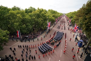 The procession turns down The Mall from Horse Guards Road towards Buckingham Palace
