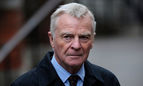 Max Mosley wearing a shirt and tie