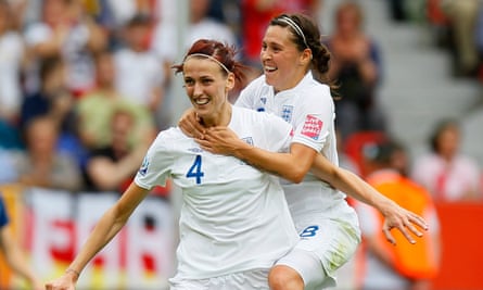 Jill Scott with Fara Williams, the only player with more England caps, after scoring at the 2011 World Cup.
