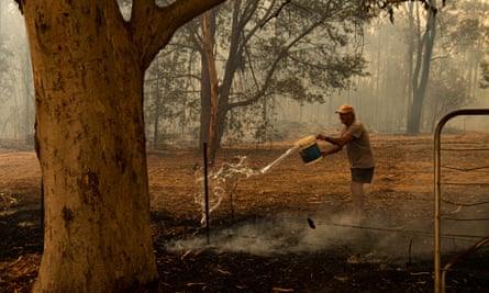 Trevor Colliss fights the fire at Kulnara, near Mangrove mountain, NSW. 6 December 2019