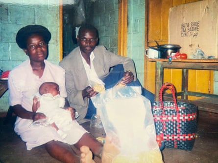 Patson Muzuwa with his first wife and baby daughter in Rugare in 2000.