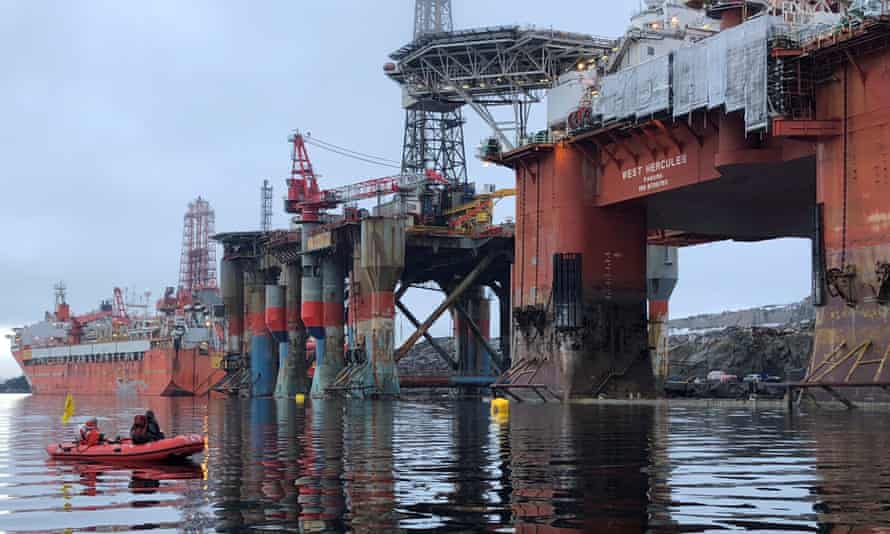Greenpeace activists boarding an oil rig in a fjord off the West coast of Norway in 2018.