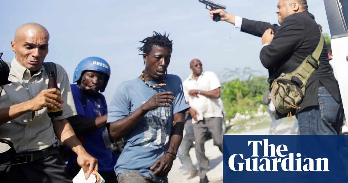 Haiti: photojournalist shot in face as senator opens fire outside parliament