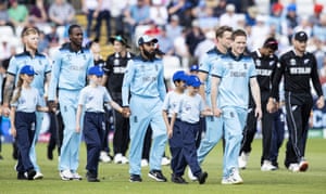 Morgan leads his team out.