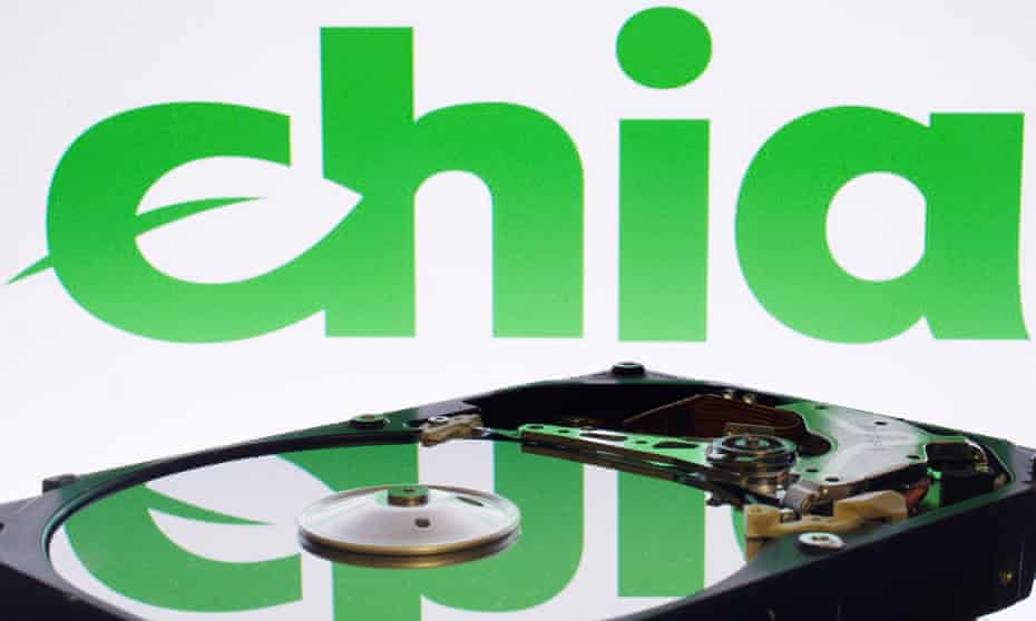 The Chia logo reflected in the plate of a computer hard disk