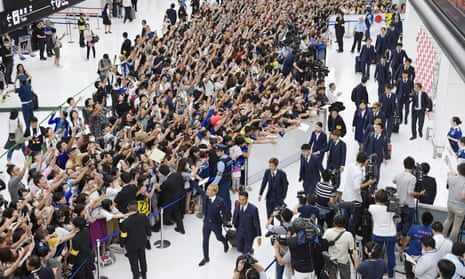 Japan's football team return from the World Cup