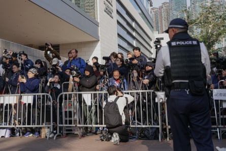 Members of the media outside the West Kowloon magistrates courts in Hong Kong