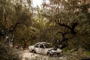 Pombal, Portugal. A gutted car after wildfires swept across the central part of the country amid temperatures exceeding 40C