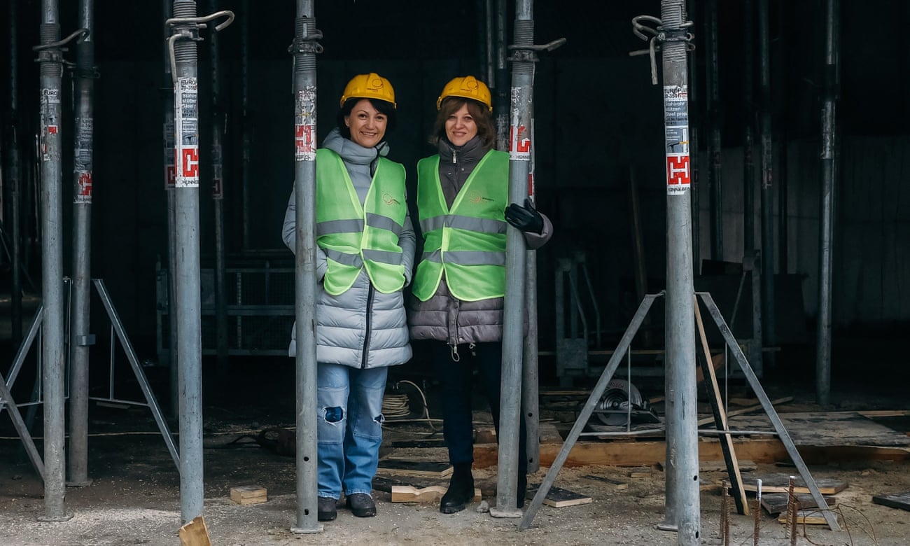 The co-founders of the Give Life Association, Oana Gheorghiu (R) and Carmen Uscatu, pictured at the hospital construction site