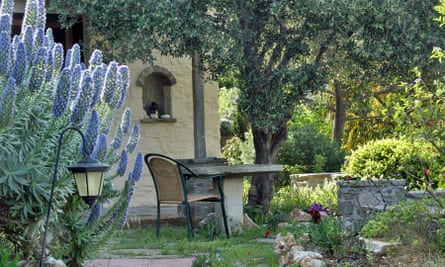 Image of the garden with wicker chair and table at To the Garden, Paros, Greece