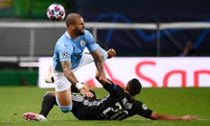 Manchester City’s Kyle Walker is tackled by Lyos’ Fernando Marcal.