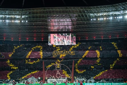 Bayer Leverkusen fans display a tifo prior to the DFB cup semifinal match between Bayer Leverkusen and Fortuna Dusseldorf at BayArena on April 3, 2024.