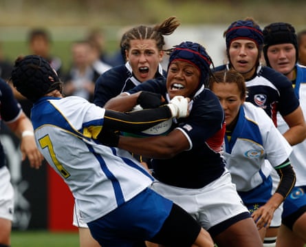 Phaidra Knight of the U.S. shakes off a tackle from Kazakhstan’s Irina Radzivil at the 2010 World Cup in England.