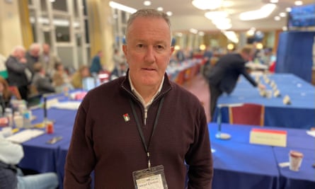 Conor Murphy inside the Seanad elections count centre with tables behind him for counting ballot papers