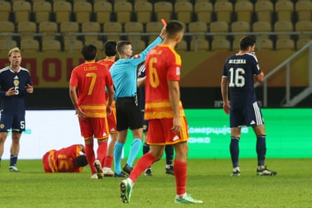 Scotland’s Scott McKenna is given his marching orders.