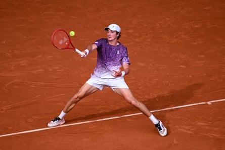 João Fonseca plays a forehand against Novak Djokovic