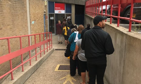 A queue at Royal Mail’s Peckham delivery office in London. 