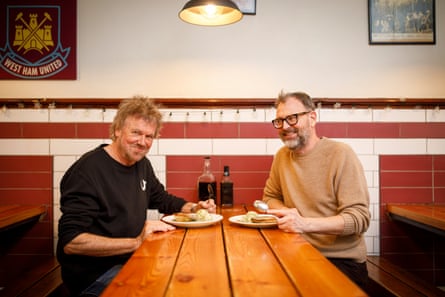 Tim and Don about to eat pie and mash.