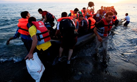 migrants arrive by boat in greece
