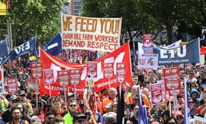 Protesters march in Melbourne as part of the ‘Change the Rules’ rally organised by the ACTU