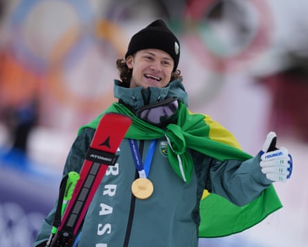 Brazil’s Lucas Pinheiro Braathen celebrates winning the gold medal