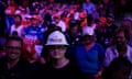 People attend a campaign town hall meeting with Republican presidential nominee Donald Trump, moderated by Arkansas governor Sarah Huckabee Sanders, in Flint, Michigan, on Tuesday.