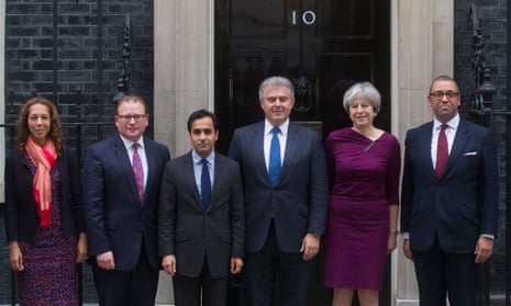 Theresa May outside Downing Street with Brandon Lewis (third from right) and party chairman James Cleverly (far right).